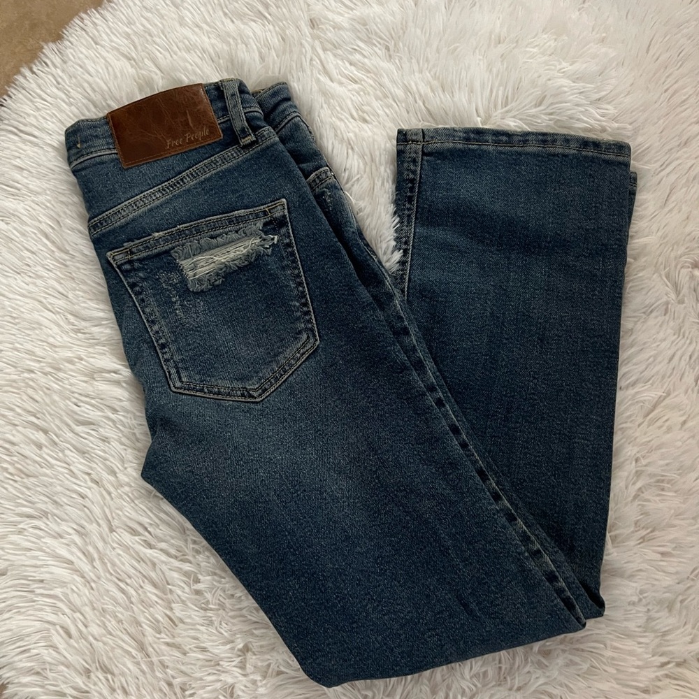 Woman’s Free People Dark Blue Distressed Jeans